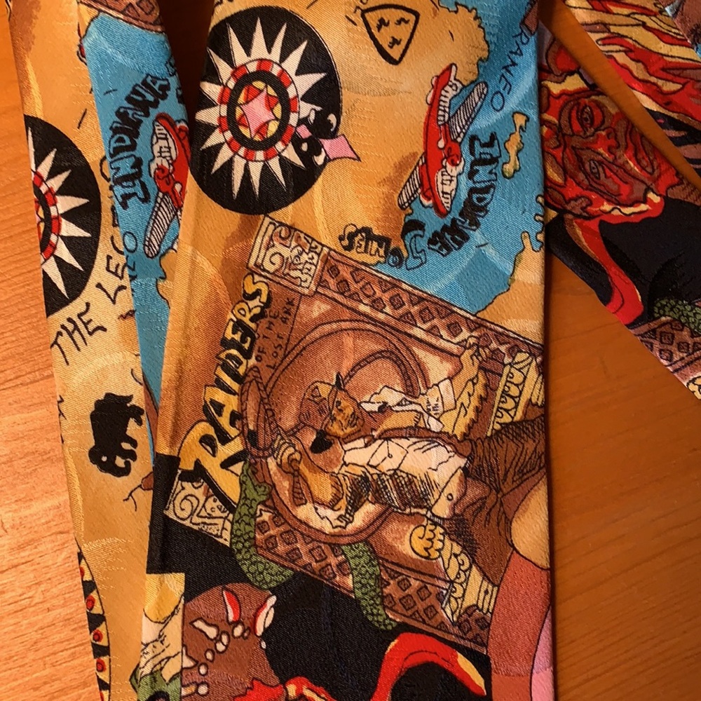 Raiders of the Lost Ark theme Nicole Miller 100% Silk men’s tie.. Like new.